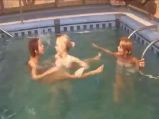 Bewitching lezzies in the swimming pool