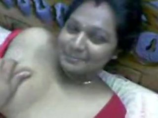 Indian enchanting Desi Aunty In Red Dress
